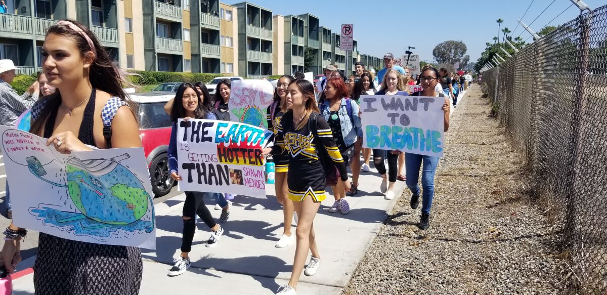 Climate-conscious students head to a rally at Kendall-Frost Mission Bay Marsh Reserve, Sept. 20.