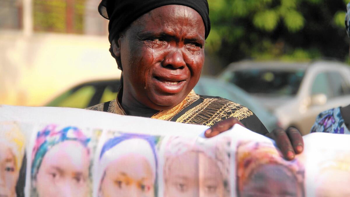 The mother of a girl abducted by Boko Haram takes part in a rally in Abuja, Nigeria, in January 2016.