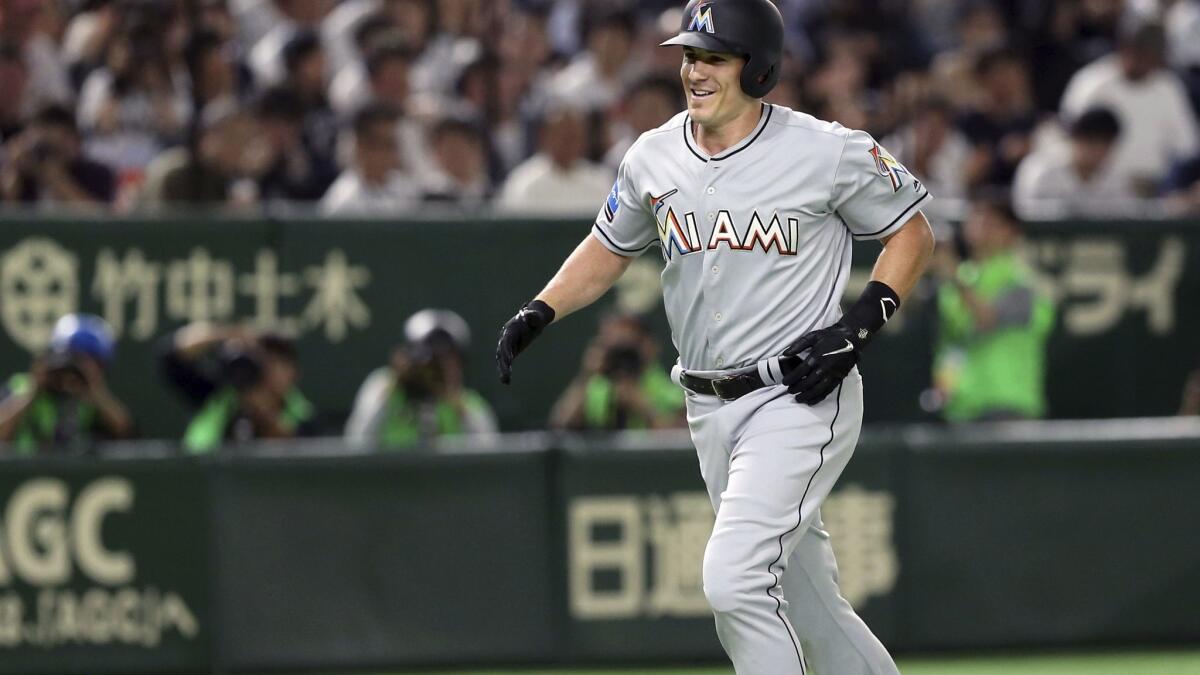 MLB All-Star designated hitter J.T. Realmuto of the Miami Marlins rounds third base after hitting a solo home run off All Japan starter Shinsaburo Tawata in the fourth inning of Game 3 of their All-Stars Series baseball at Tokyo Dome in Tokyo on Nov. 11, 2018.