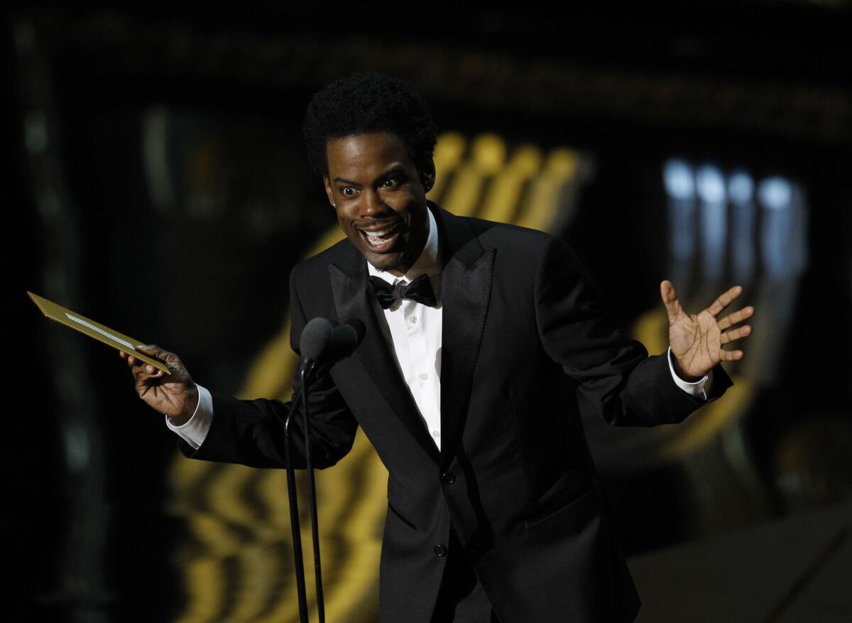 Chris Rock serves as a presenter at the Academy Awards ceremony on Feb. 26, 2012.