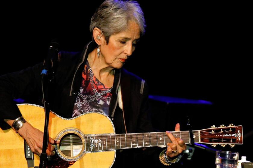 American folk singer Joan Baez performs at a concert in Burgos, northern Spain, on Wednesday, March 3, 2010. Baez is on a world tour to promote her new album "How Sweet the Sound." (AP Photo/I.Lopez) User Upload Caption: Joan Baez