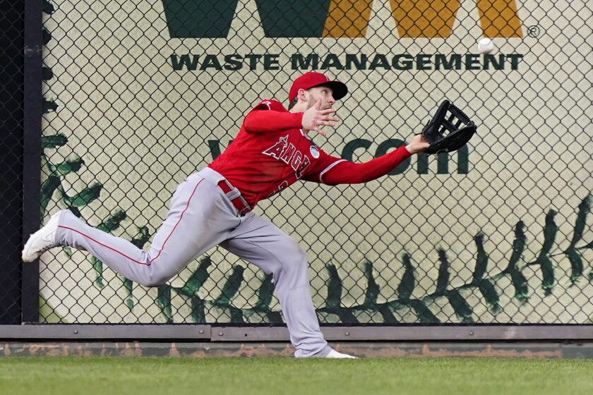 Angels right fielder Taylor Ward catches a fly out by Philadelphia Phillies' Nick Castellanos.