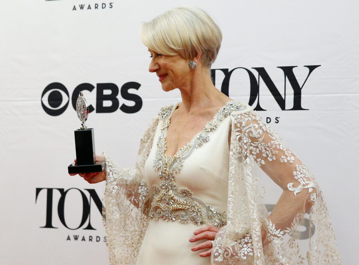 Actress Helen Mirren holds the Tony Award for actress in a leading role in a play.