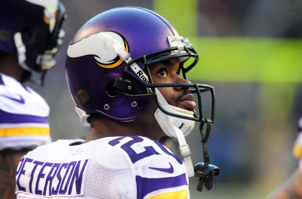 Adrian Peterson, shown in 2013, played just one game for the Vikings last season.