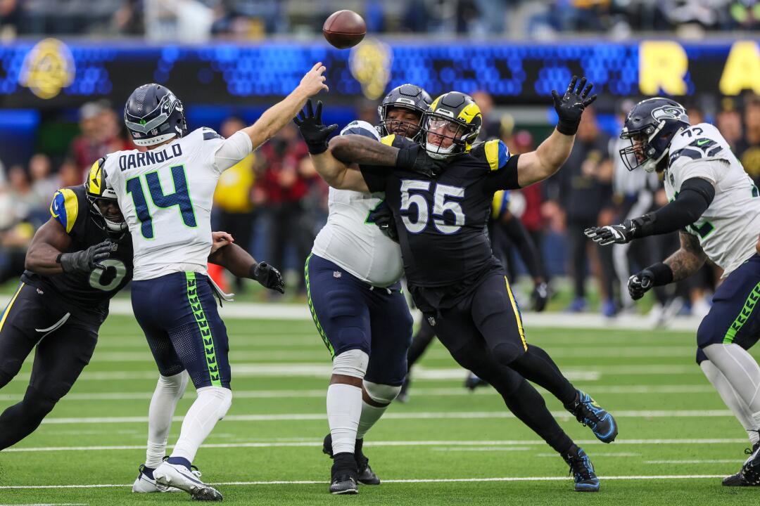 Rams lean on four picks to edge Seattle and take first in NFC West ...