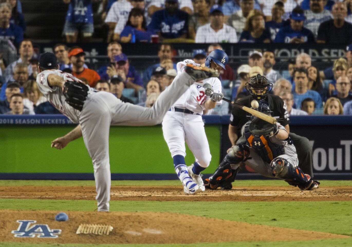 Dodgers left fielder Joc Pederson connects for a solo home run against Houston's Justin Verlander.