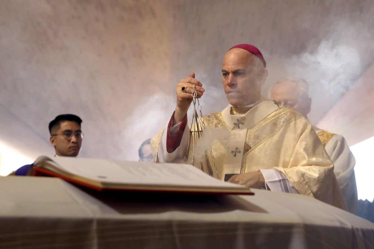 An archbishop with a smoking censer