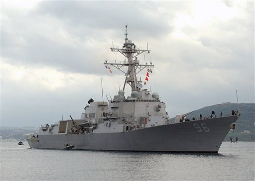 In this Jan 10, 2008 photo released by the U.S. Navy, the Arleigh Burke-class guided missile destroyer USS Bainbridge (DDG 96) arrives at the Marathi NATO Pier Facility in Souda Bay, Crete, Greece for a routine port visit. U.S. officials say an the USS Bainbridge and a half dozen others are headed to the scene where pirates captured a vessel with a U.S. crew off Somalia's coast. A person aboard the Maersk Alabama, reached by The Associated Press by satellite phone, says crew members had retaken control of the ship. (AP Photo U.S. Navy, Paul Farley)