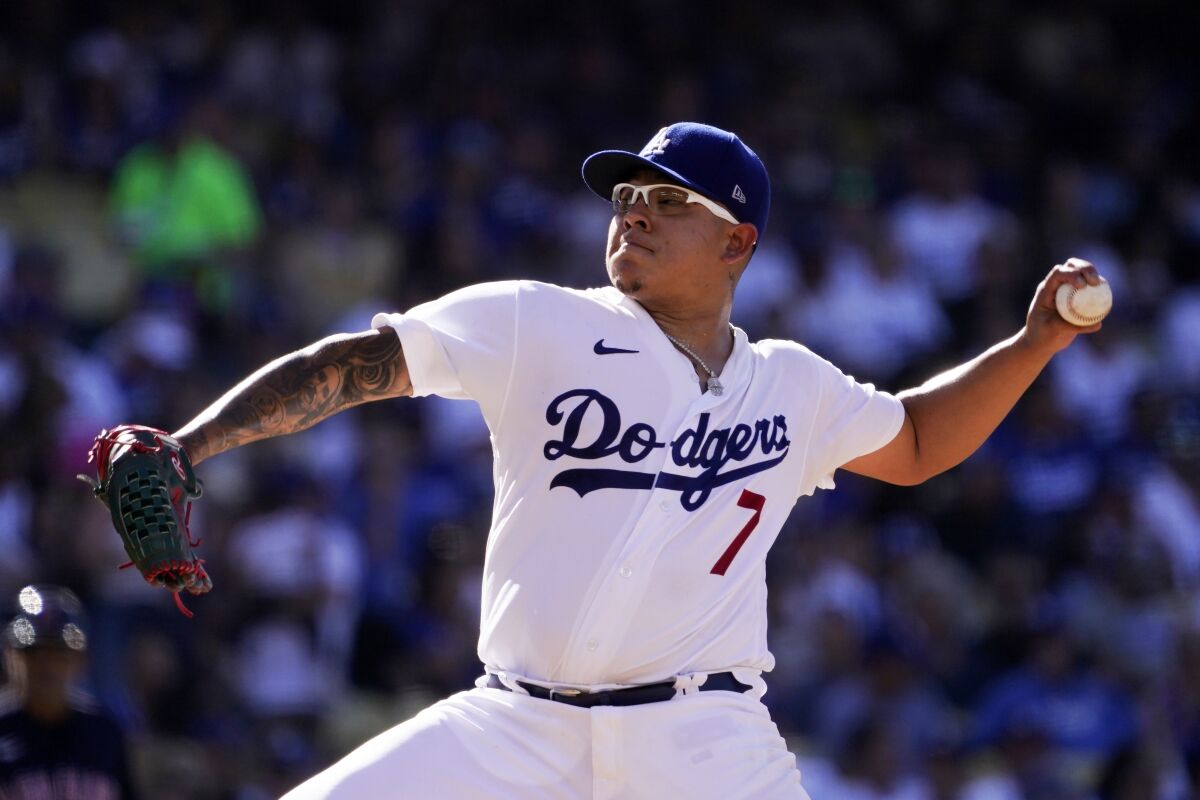 Dodgers pitcher Julio Urías delivers during the Dodgers' 7-1 win over the Cleveland Guardians on Saturday.