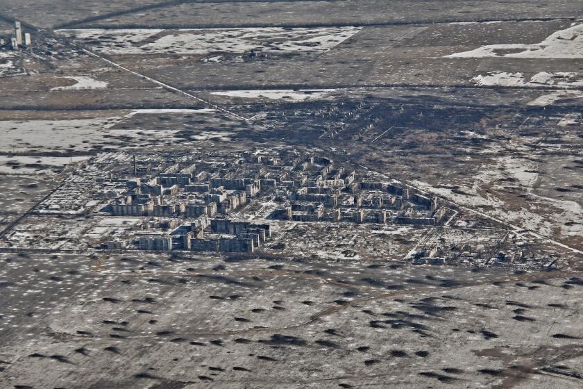 FILE - An aerial view of Vuhledar, the site of heavy battles with the Russian troops in the Donetsk region, Ukraine, Feb. 10, 2023. (AP Photo/Libkos, File)