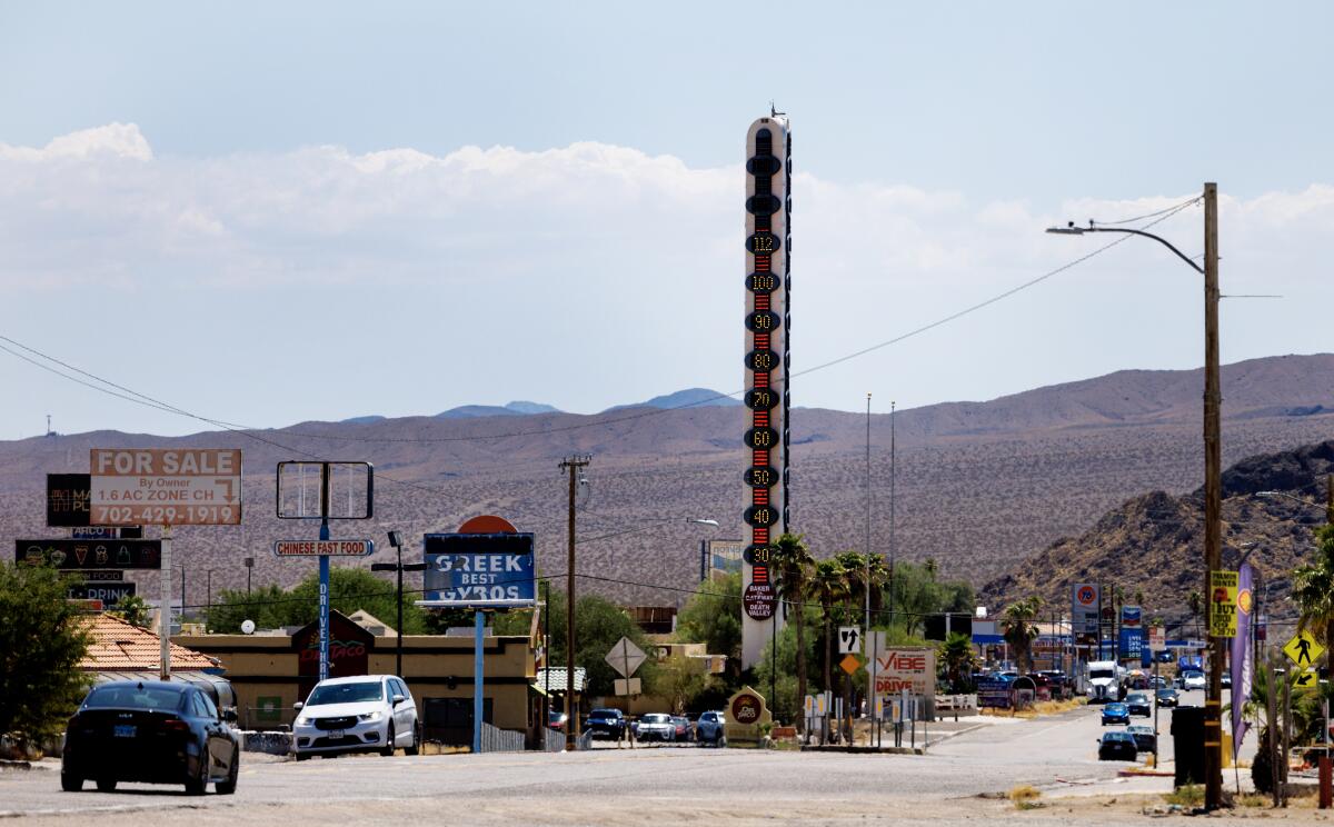 A giant thermometer in Baker, Calif., reads 112 degrees on Friday.