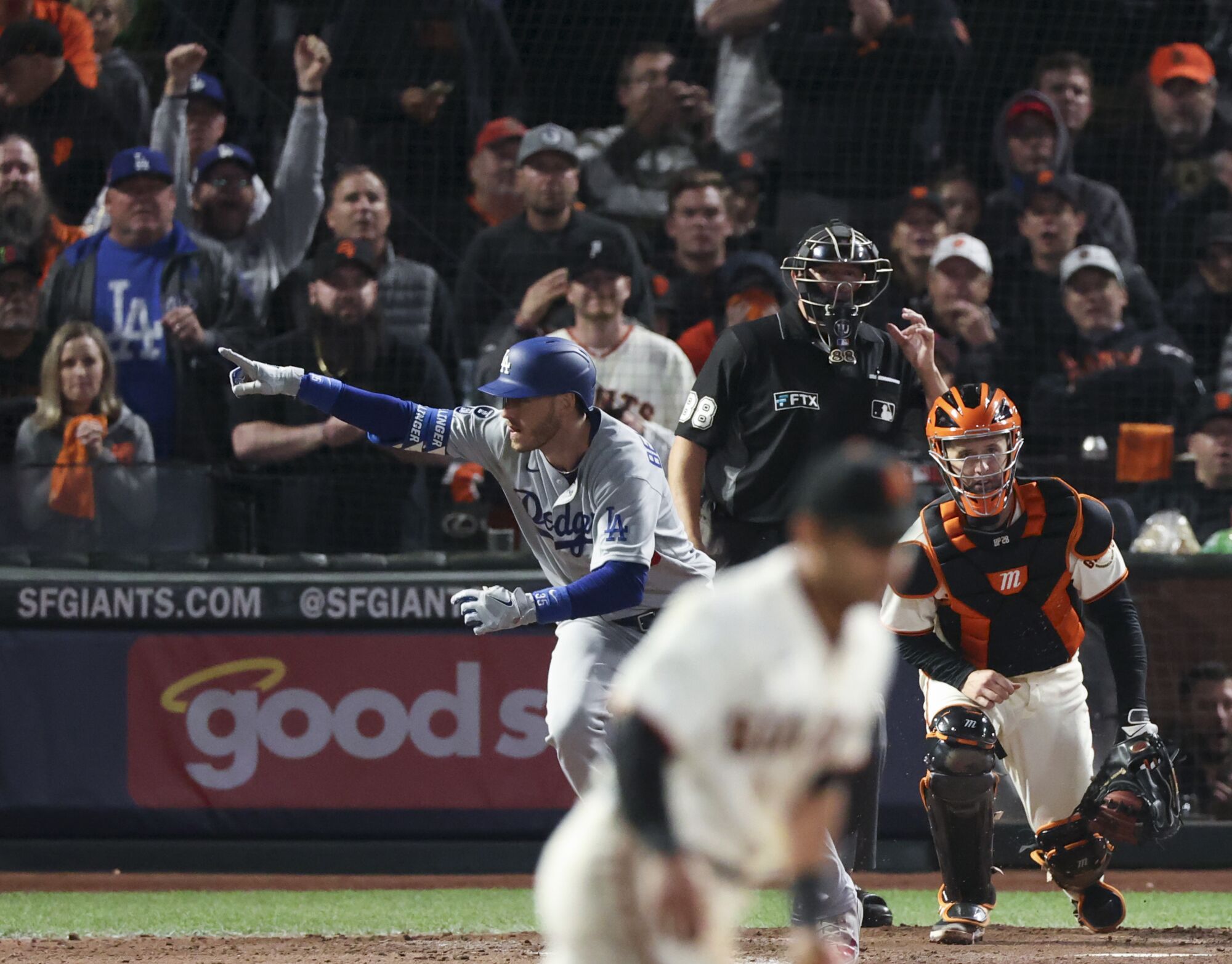 October 14: Los Angeles Dodgers' Cody Bellinger gestures after hitting the go-ahead RBI single