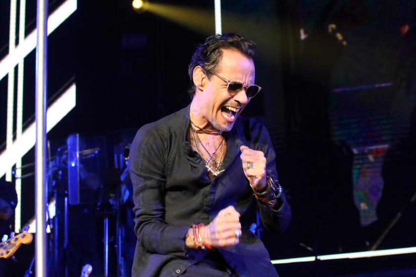 Latin singer and songwriter Marc Anthony performs during the Marc Anthony PA'LLA VOY concert at the Crypto.com Arena in Los Angeles on Friday, March 18, 2022.