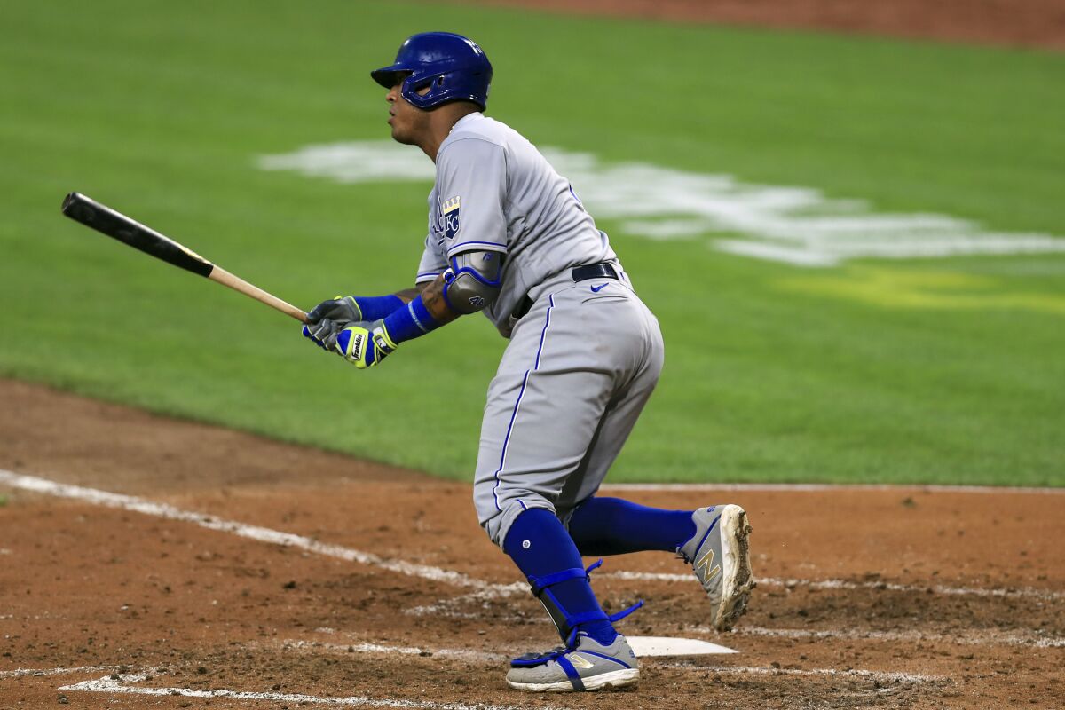 Kansas City Royals' Salvador Perez singles in the fifth inning during a baseball game against the Cincinnati Reds in Cincinnati, Wednesday, Aug. 12, 2020. (AP Photo/Aaron Doster)