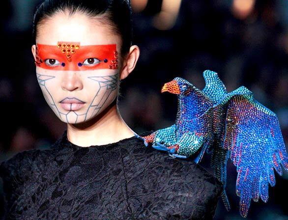 A model presents a creation by Indian designer Manish Arora at Paris Fashion Week.