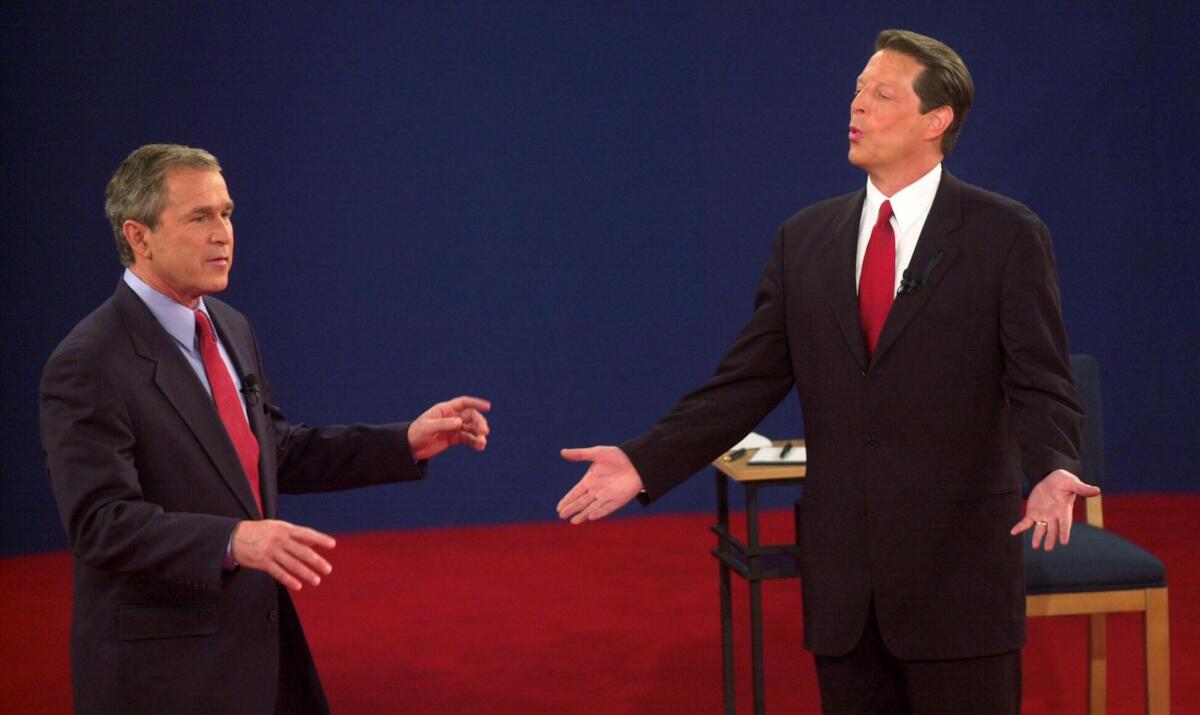 Vice President Al Gore and Texas Gov. George W. Bush debate on Oct. 17, 2000, weeks before the presidential election. 