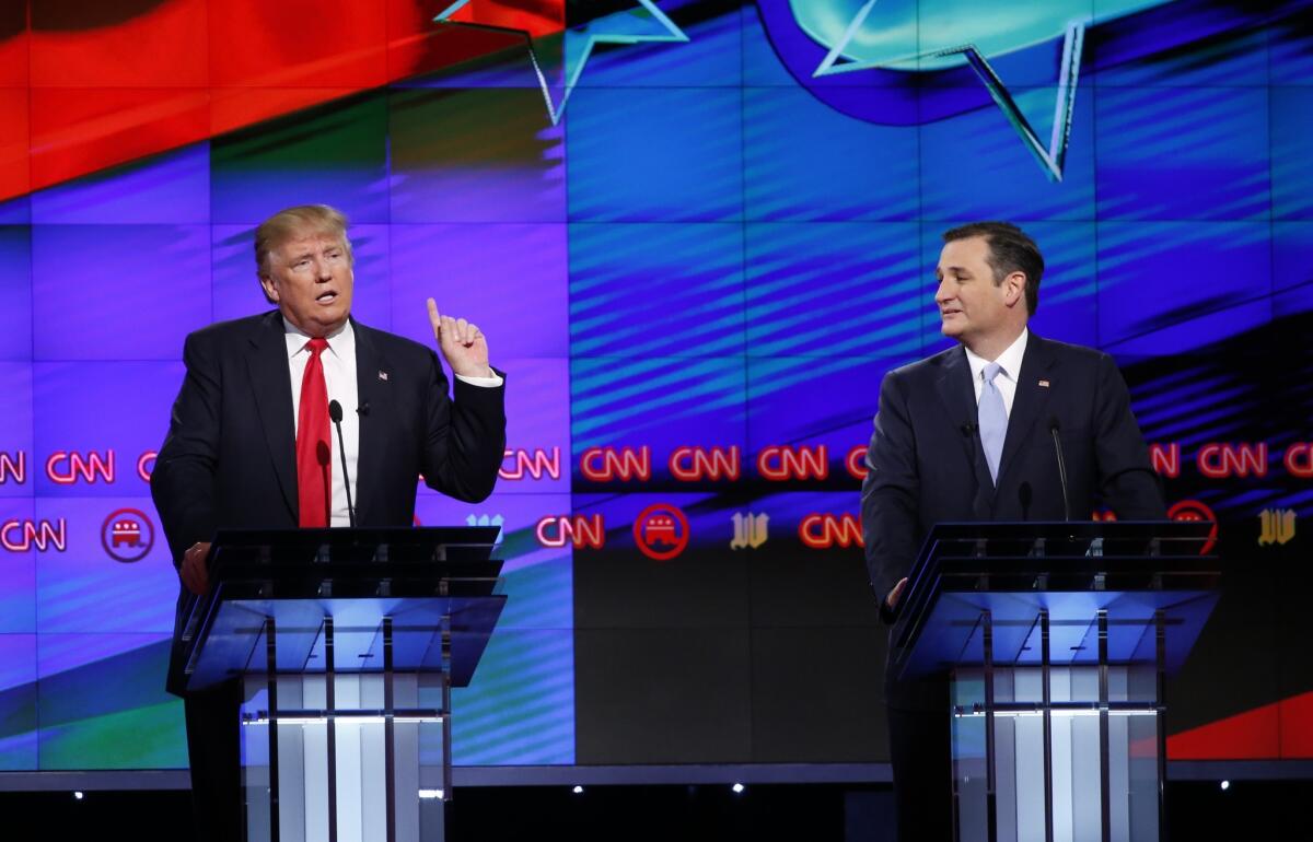 Ted Cruz, right, endorsed his former GOP primary rival Donald Trump on Friday.