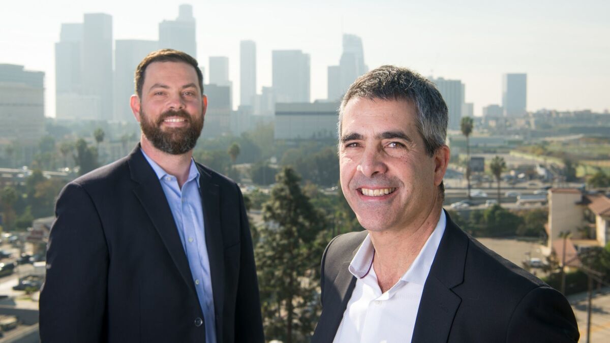 Brian Falls, left, Palisades vice president of development, and Paul Danna, design director at Skidmore, Owings & Merrill.