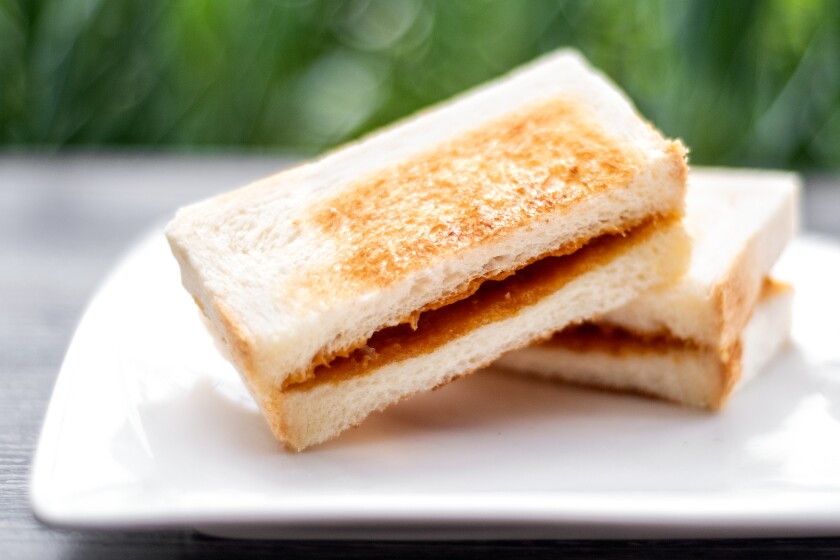 Toast cut in halves on a plate
