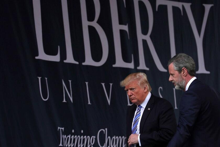 LYNCHBURG, VA - MAY 13: Accompanied by President Jerry Falwell (R), U.S. President Donald Trump (L) leaves after he delivered keynote address during the commencement at Liberty University May 13, 2017 in Lynchburg, Virginia. President Trump is the first sitting president to speak at Liberty's commencement since George H.W. Bush spoke in 1990. (Photo by Alex Wong/Getty Images) ** OUTS - ELSENT, FPG, CM - OUTS * NM, PH, VA if sourced by CT, LA or MoD **