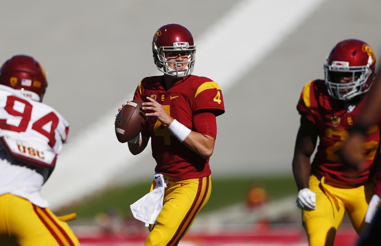 Quarterback Max Browne looks for an open receiver during USC's spring game. Browne completed seven of 11 passes for 114 yards and three touchfowns with no interceptions.