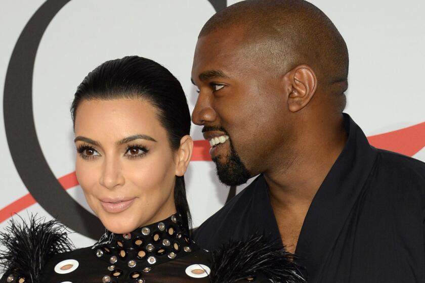 Kim Kardashian rolled the public announcement that she's carrying a baby boy into a Father's Day tweet praising Kanye West as "such a good daddy."
