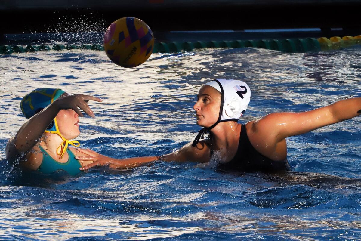 Team USA's Maddie Musselman (2) defends against Australia's Charlize Andrews (7) during Tuesday night's match.