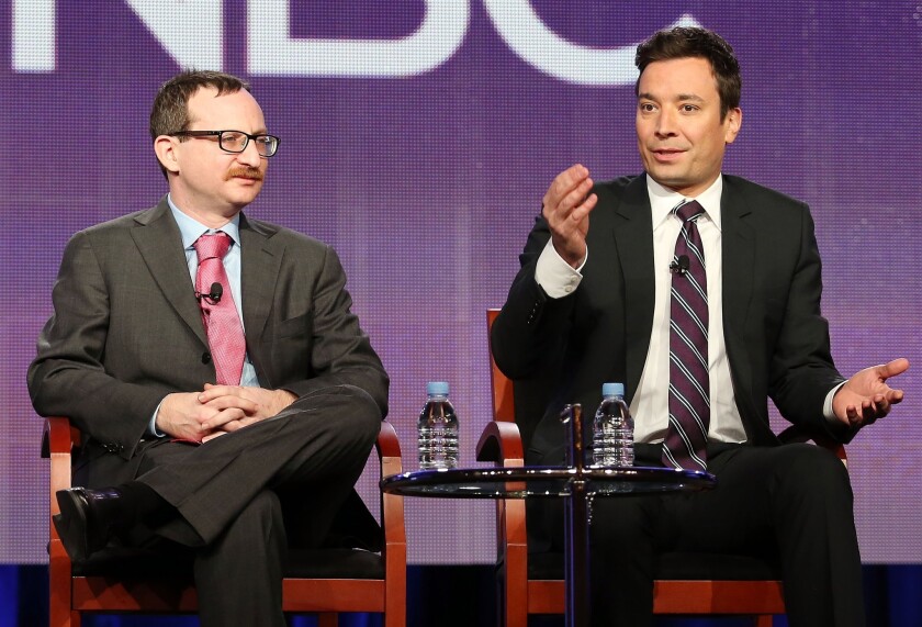 Producer Josh Lieb (L) and host Jimmy Fallon of the television show "The Tonight Show Starring Jimmy Fallon" speak during the NBC portion of the 2014 Television Critics Association Press Tour.