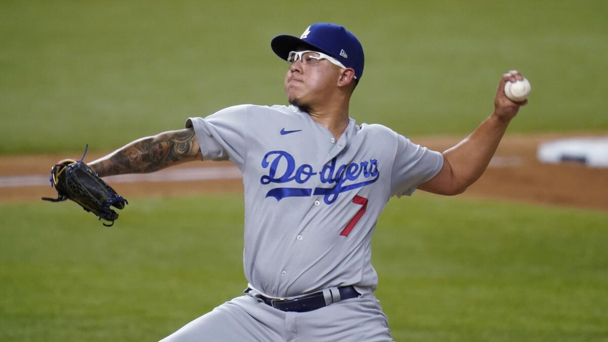 Julio Urias delivers a pitch against the Padres.