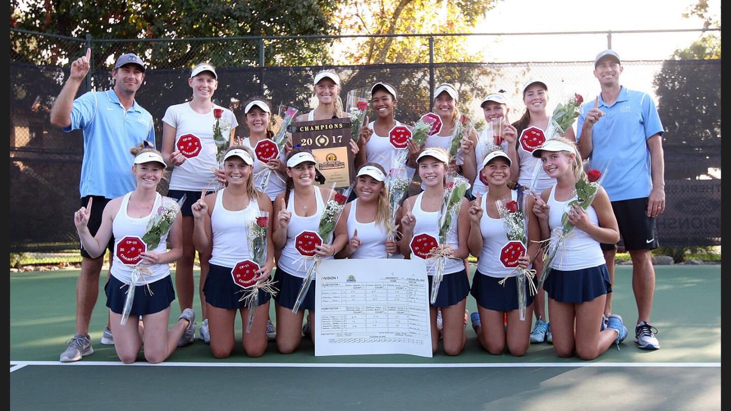 The Corona del Mar girls' tennis team after winning the CIF girls' tennis Division I championship at The Claremont Club in Claremont on Friday, November 10, 2017.