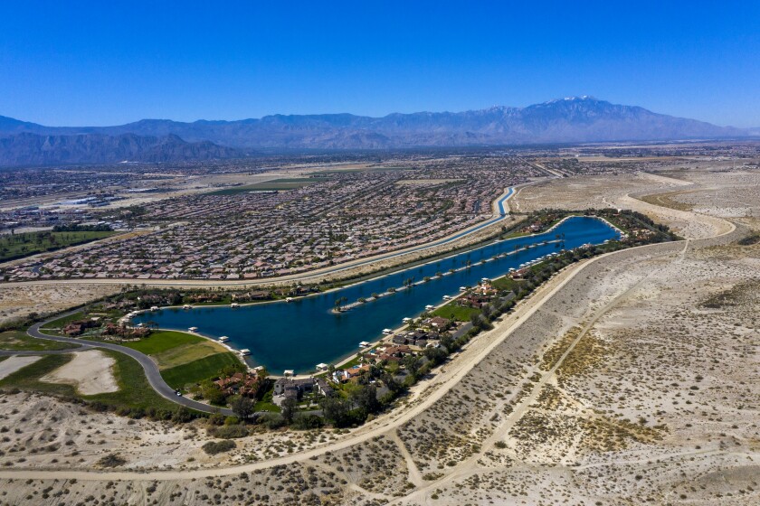 Indio, CA - February 24: A drone view of the Shadow Lake Estates, visible from parts of Indio Hills Badlands Trails on Wednesday, Feb. 24, 2021 in Indio, CA. (Allen J. Schaben / Los Angeles Times)
