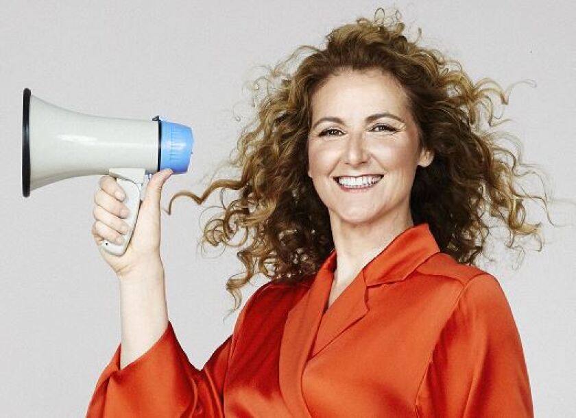 Dr. Jen Gunter holds a megaphone.