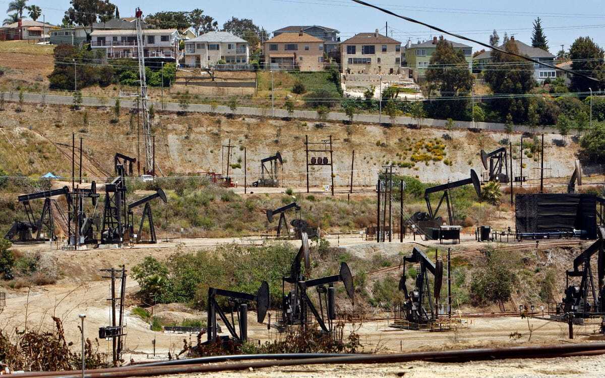 Homes overlook the Inglewood Oil Field in the Los Angeles area.