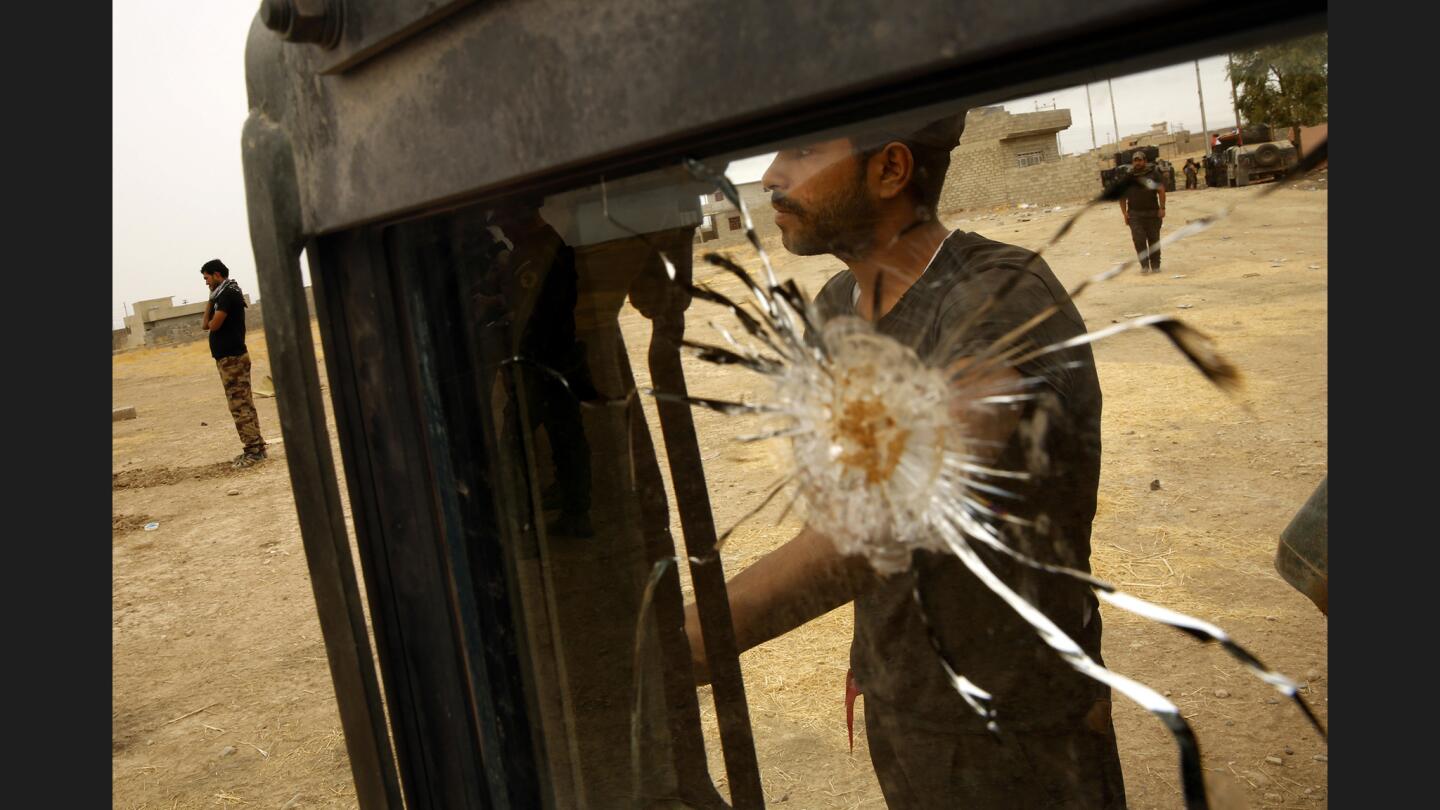 An Iraqi government Humvee window cracked by Islamic State fire on the eastern front in fight for Mosul.