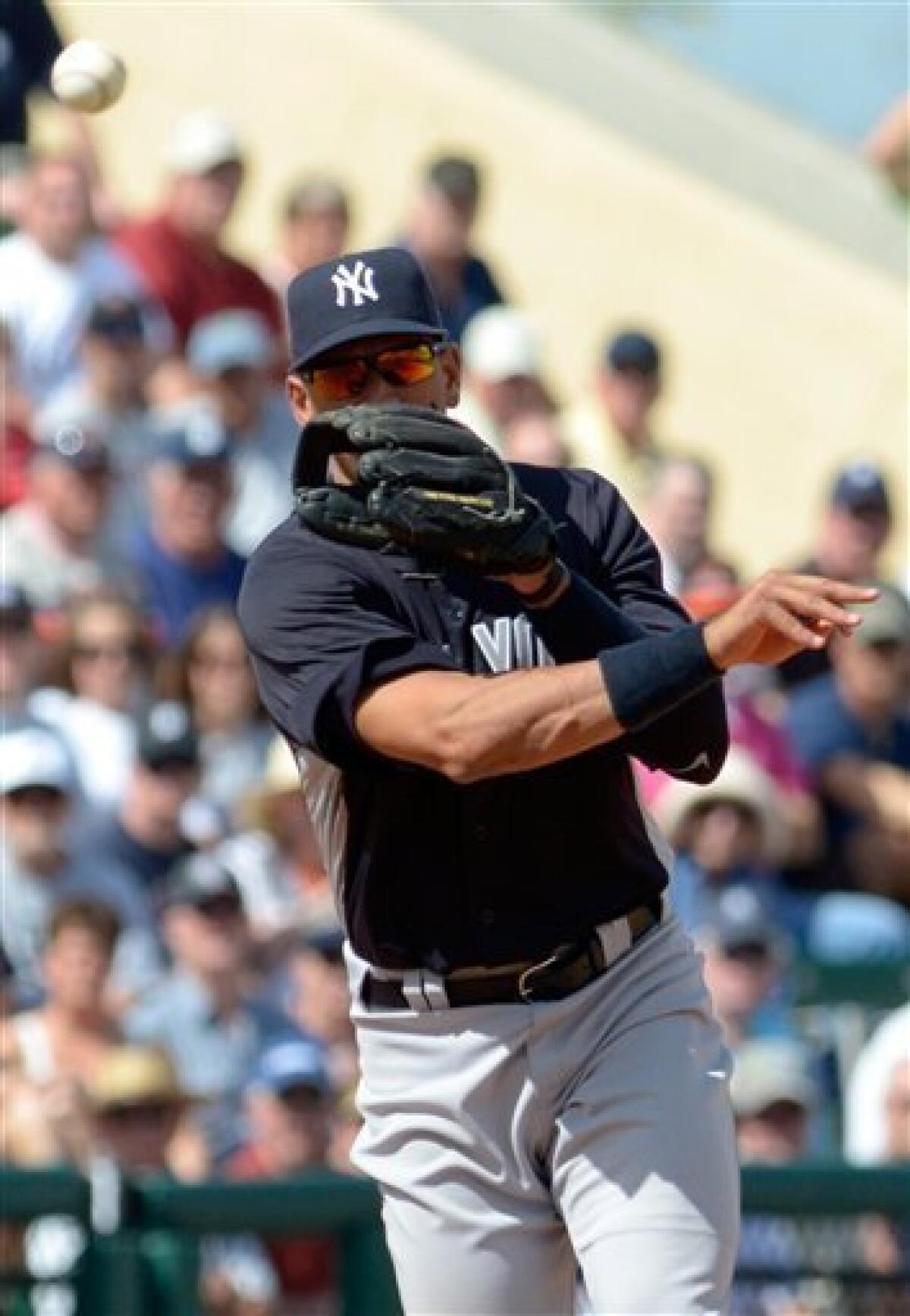 Detroit Tigers' Andy Dirks takes an at-bat during a spring