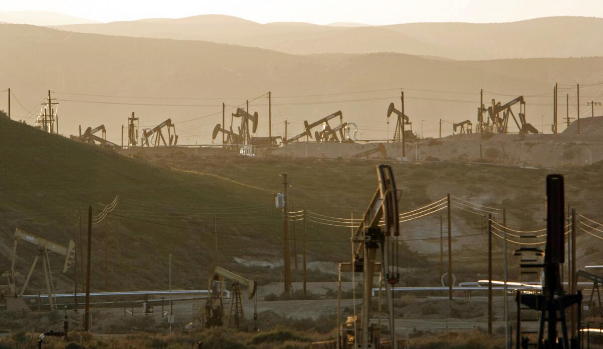 Oil rig pump jacks work the oil fields in Kern County, a primary area for fracking.