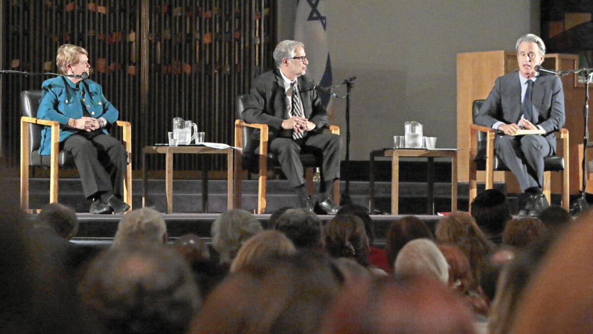 Board of Supervisors candidates Sheila Kuehl, left, and Bobby Shriver, right, take part in a debate in Encino.