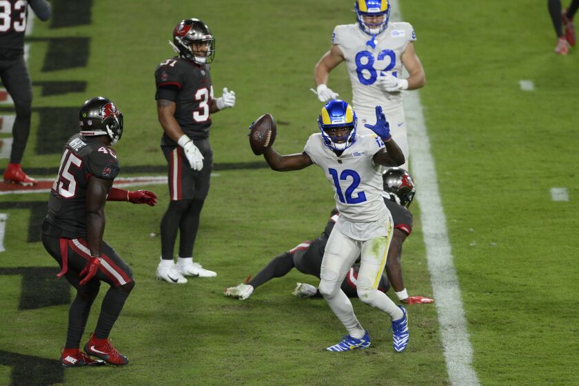 Los Angeles Rams wide receiver Van Jefferson (12) celebrates his score against the Tampa Bay Buccaneers during the first half of an NFL football game Monday, Nov. 23, 2020, in Tampa, Fla. (AP Photo/Jason Behnken)
