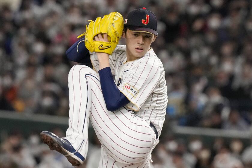 Roki Sasaki of Japan pitches during their Pool B game against the Czech Republic.