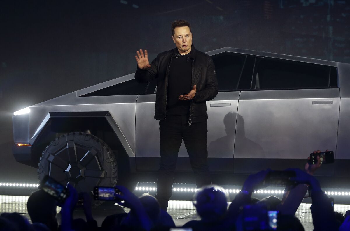 Tesla CEO Elon Musk introduces the Cybertruck at Tesla's design studio on Nov. 21 in Hawthorne.