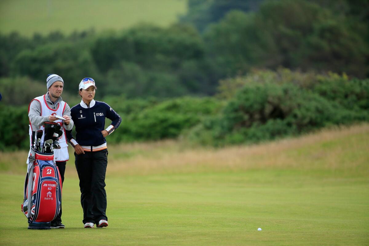Jin-Young Ko of South Korea waits to play her second shot at the par 5, 14th hole during the third round of the Women's British Open at Trump Turnberry Resort in Turnberry, Scotland.