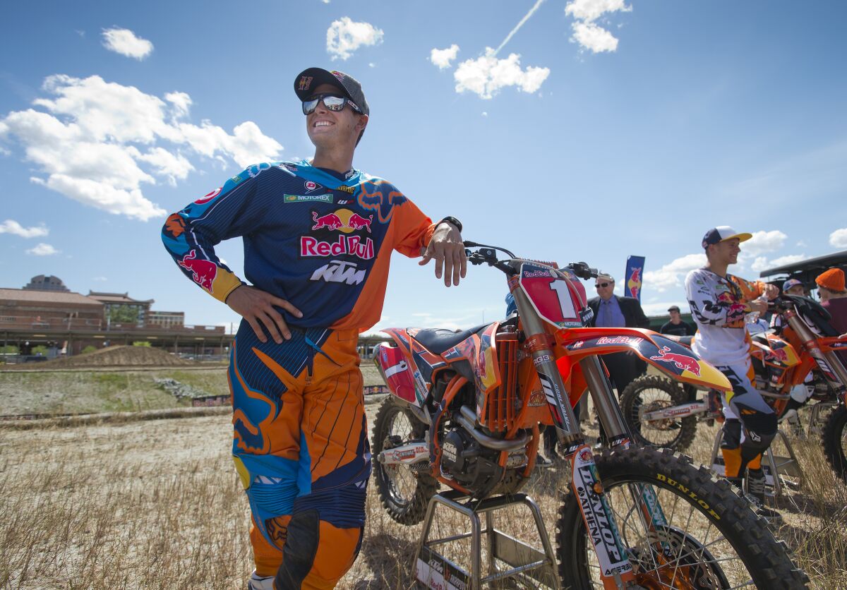 FILE - Ryan Dungey talks to reporters May 16, 2013, after demonstration rides on a temporary track set up at the downtown rail yards in Sacramento, Calif. Three-time motocross champion Dungey, who returned this season after a five-year retirement, has 800,000 Instagram followers and 213,000 more on Twitter. (Paul Kitagaki Jr./The Sacramento Bee via AP, File)
