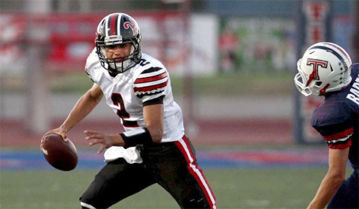 Junior quarterback Brady White looks to give Newhall Hart an effective passing game in tandem with junior receiver Trent Irwin.