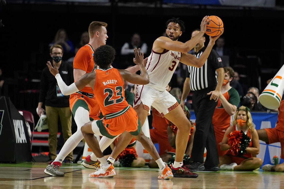 USC forward Isaiah Mobley looks to pass the ball against Miami