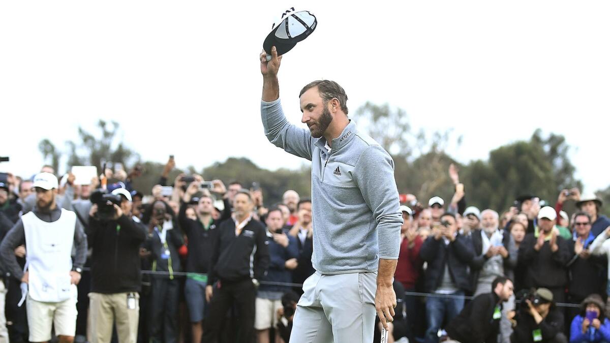 Dustin Johnson acknowledges the crowd after winning the Genesis Open.