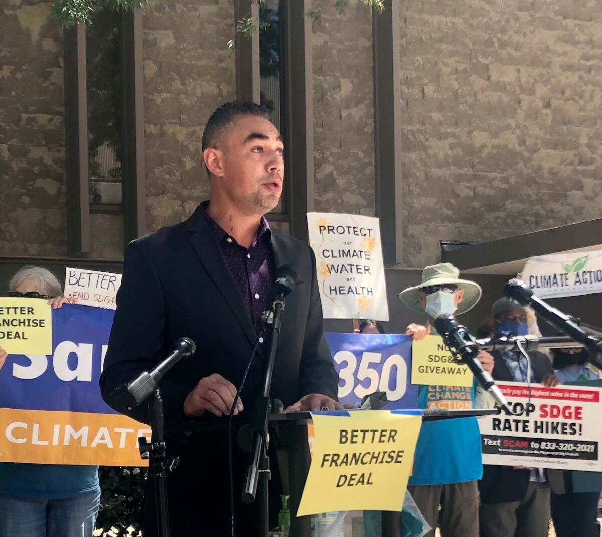 Sean Elo-Rivera, a San Diego City councilman, speaks at a rally Monday.