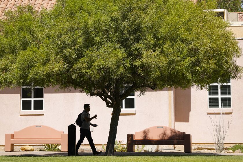 A student walks to class at the San Diego State University Imperial Valley Campus, September 11, 2019, in Calexico, California.