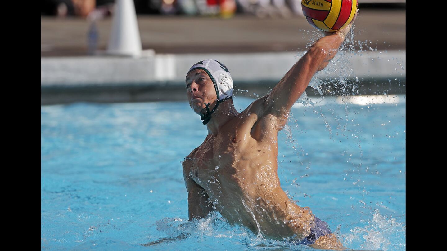 Costa Mesa High's Caedmon Fisher fires a shot during the first half against Estancia in an Orange Coast League match at Estancia High on Wednesday, Oct. 24.