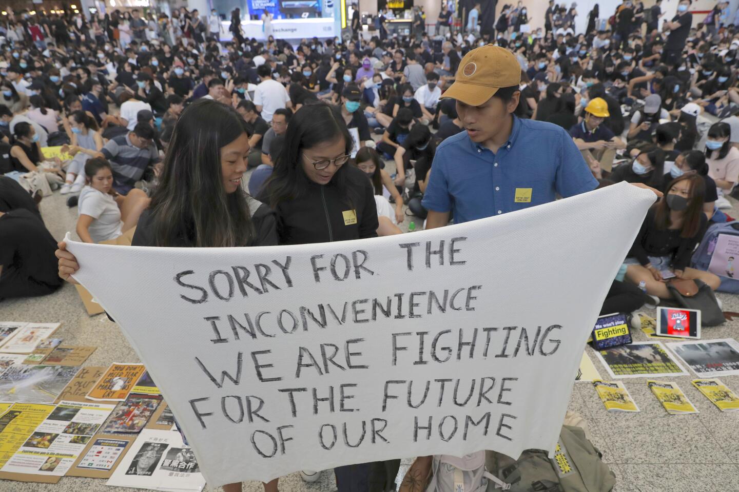 Anti-government protesters rally at Hong Kong airport