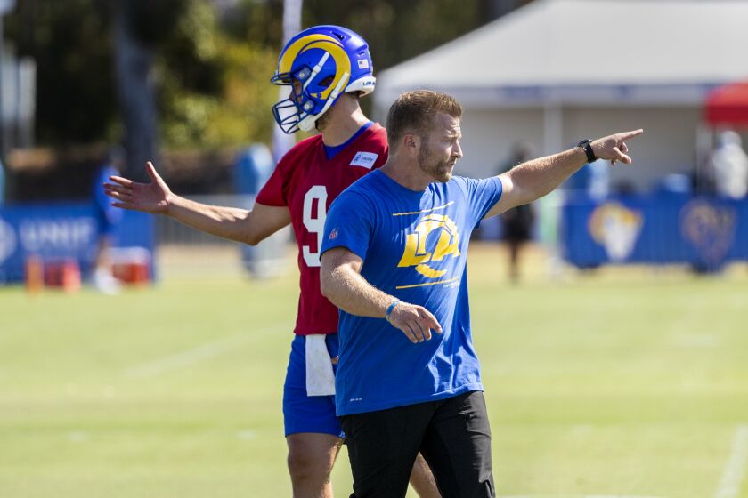 IRVINE, CA - JULY 28, 2021: Rams head coach Sean McVay and the Rams new starting quarterback Matthew Stafford (9) on the first day of training camp at UC Irvine on July 28, 2021 in Irvine, California.(Gina Ferazzi / Los Angeles Times)